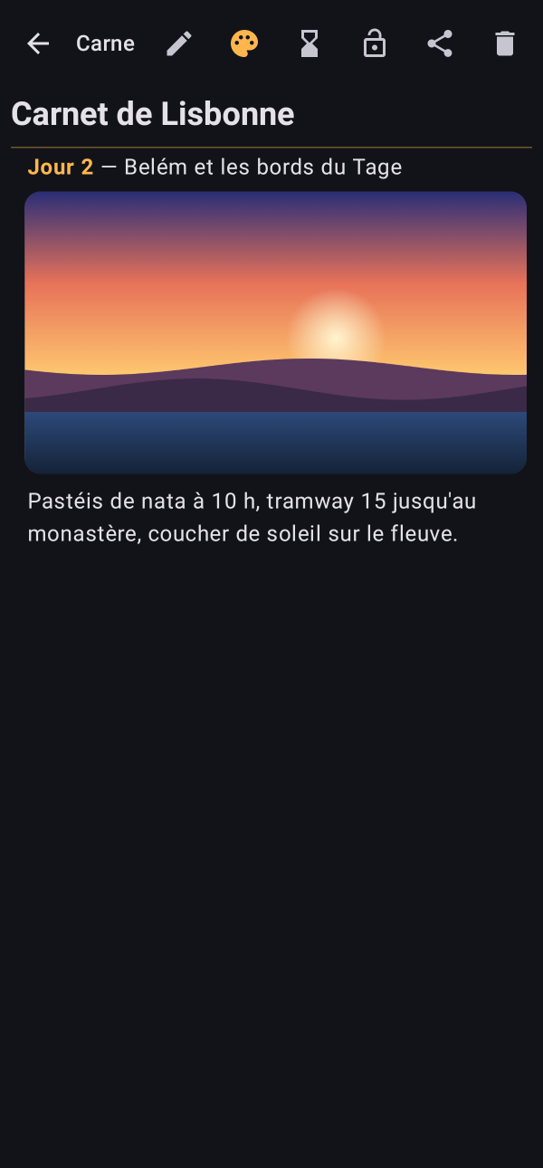 Un carnet de voyage avec une photo de coucher de soleil centrée dans la note